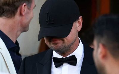 1885872-leonardo-di-caprio-face-hid.jpg - FluxNational