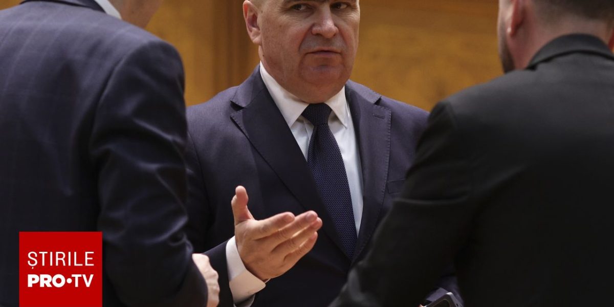 Bolojan dă replica: Vânzarea de acțiuni, în program. Criticile, doar „vuvuzele politice”