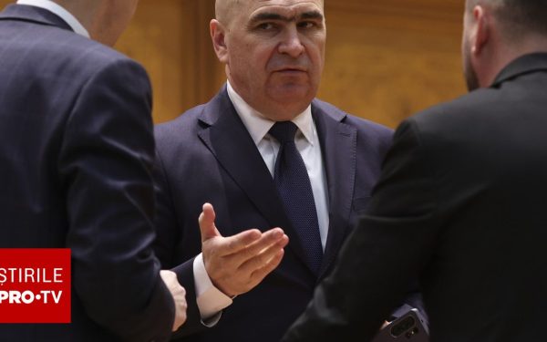 Bolojan dă replica: Vânzarea de acțiuni, în program. Criticile, doar „vuvuzele politice”